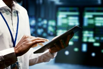 Crypto mining farm high tech workplace Close up of mechanic doing yearly infrastructure servicing in blockchain technology application specific integrated circuit high tech workplace. Professional running operations in crypto mining farm